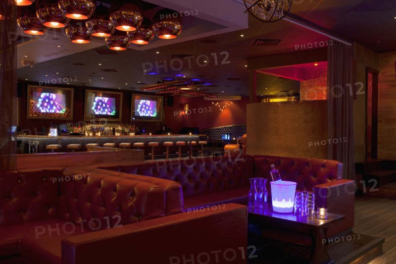 Tables and booths in empty nightclub