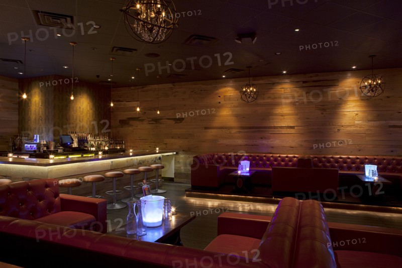 Tables and booths in empty nightclub
