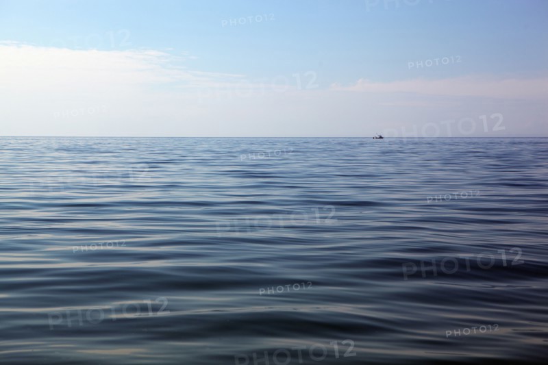 Lake under blue sky