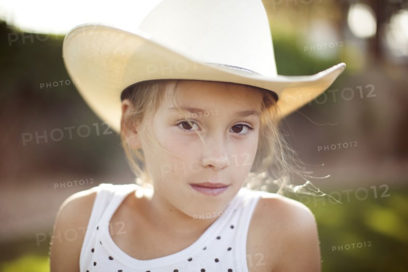 Caucasian girl in cowboy hat