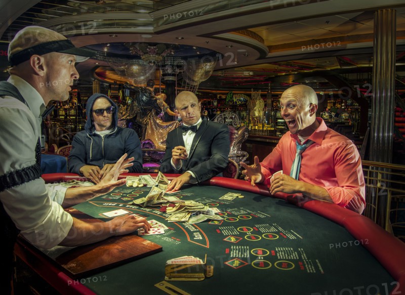 Multiple exposure of gamblers playing poker in casino