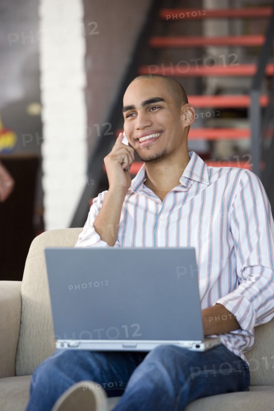 African American man talking on cell phone