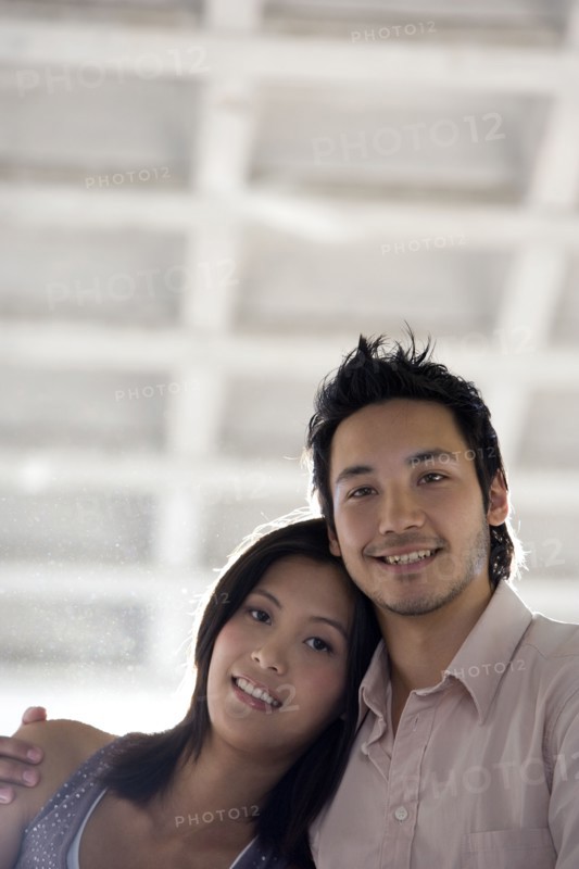 Asian couple hugging