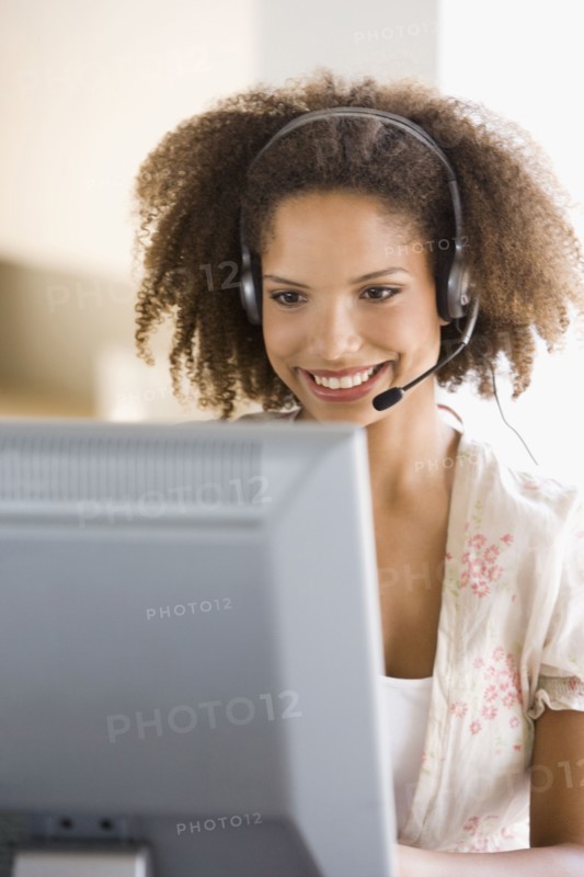 African businesswoman wearing headset