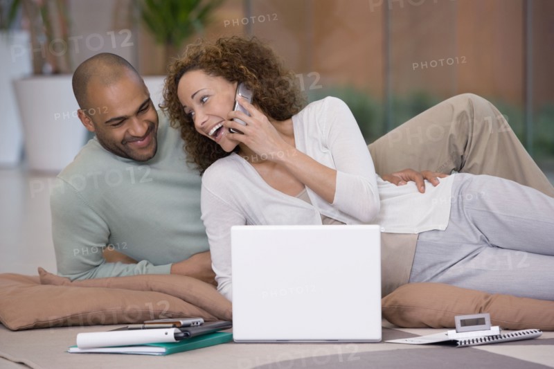 African couple working on floor