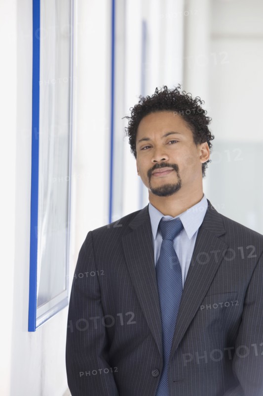 Serious African businessman with goatee