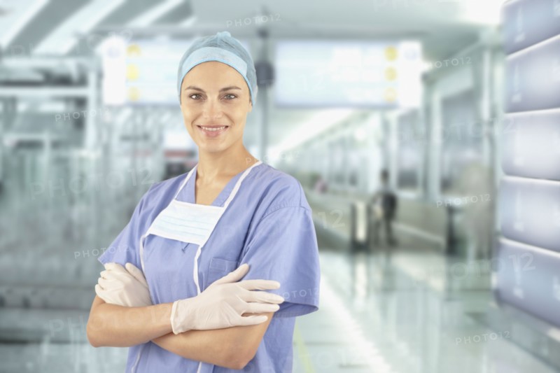 Mixed race doctor wearing scrubs in hospital