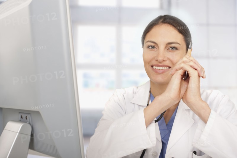 Mixed race doctor working in hospital