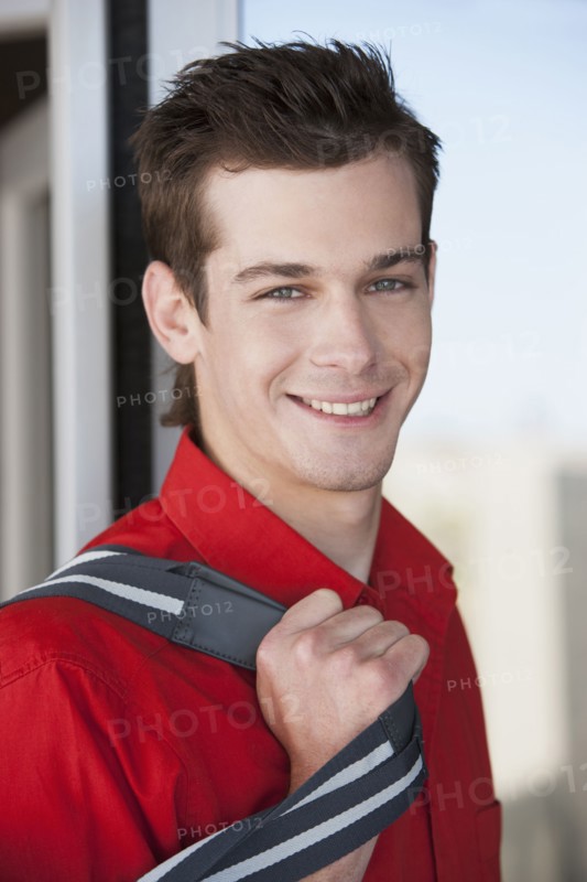 Caucasian man smiling outdoors