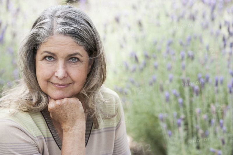 Senior Caucasian woman relaxing outdoors