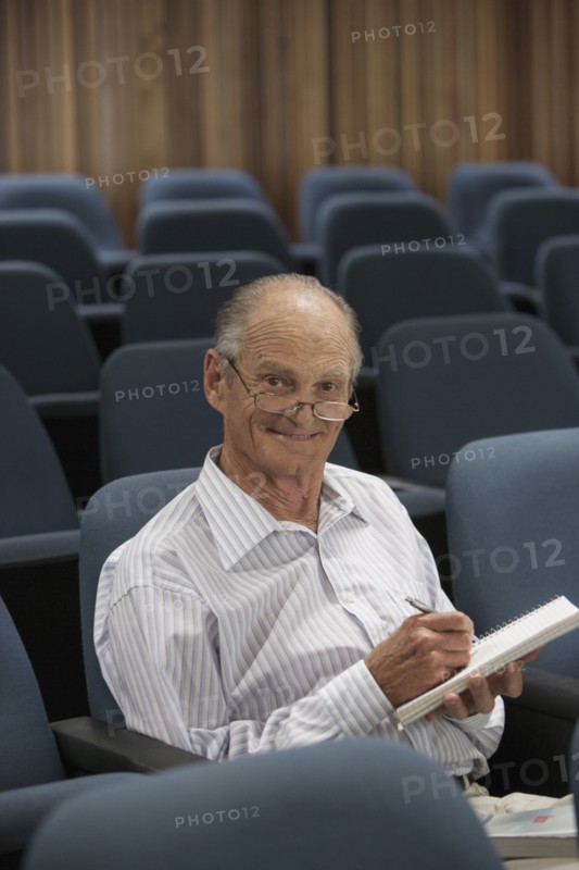 Senior Caucasian student working in classroom