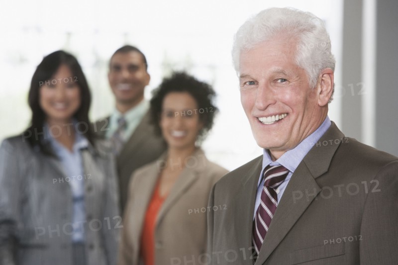 Business people smiling in office