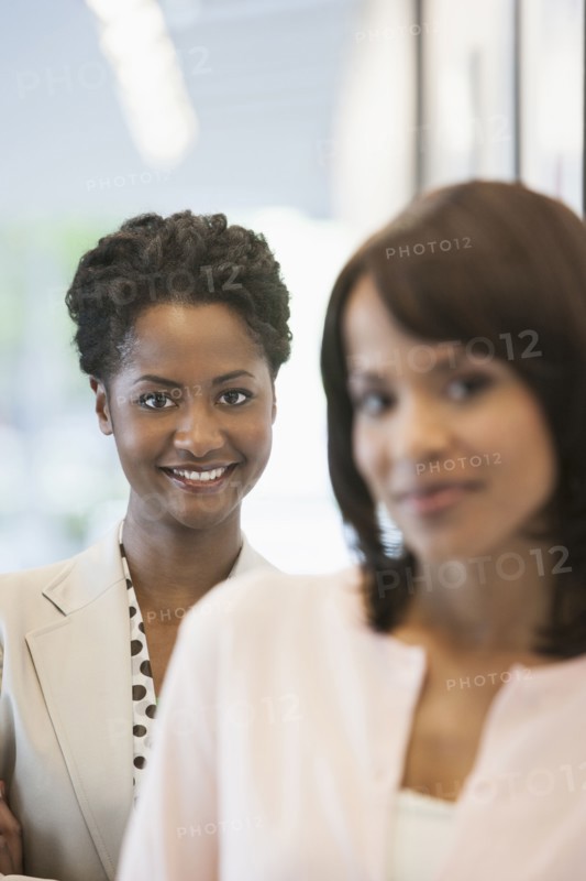 Businesswomen smiling in office