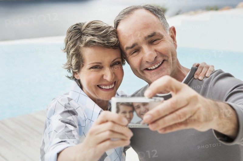 Couple taking picture together outdoors