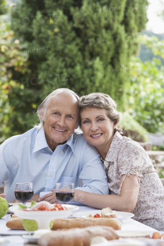 Couple eating together outdoors