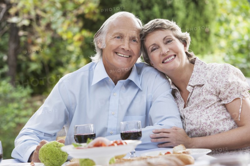Couple eating together outdoors