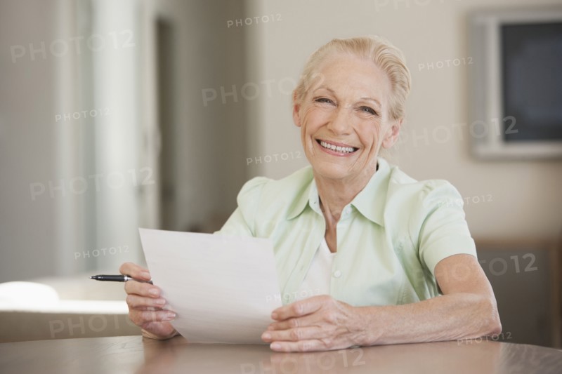 Senior Caucasian woman reading letter