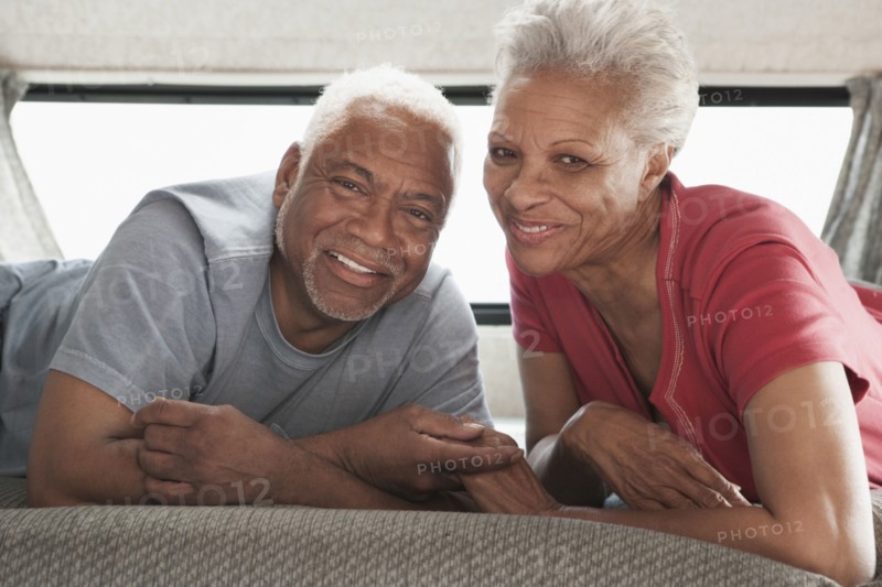 Mixed race Senior couple relaxing in RV
