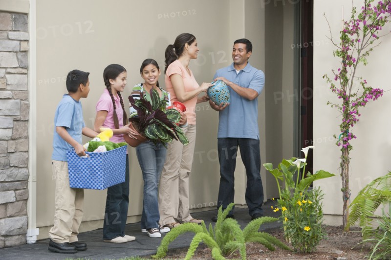 Hispanic family moving into new home