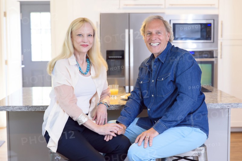 Portrait of smiling Caucasian couple in kitchen
