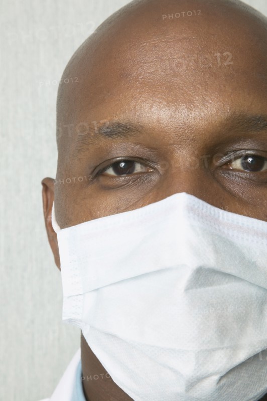 Close up of African man wearing surgical mask