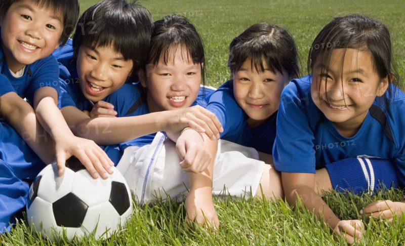 Multi-ethnic children with soccer ball
