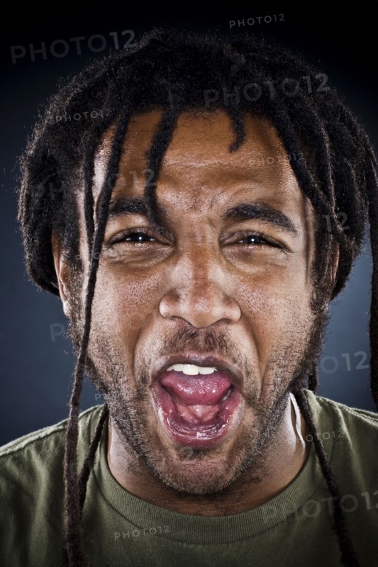 Grimacing Black man