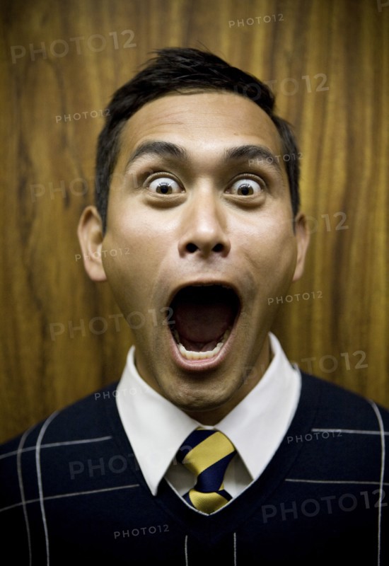 Shouting mixed race businessman