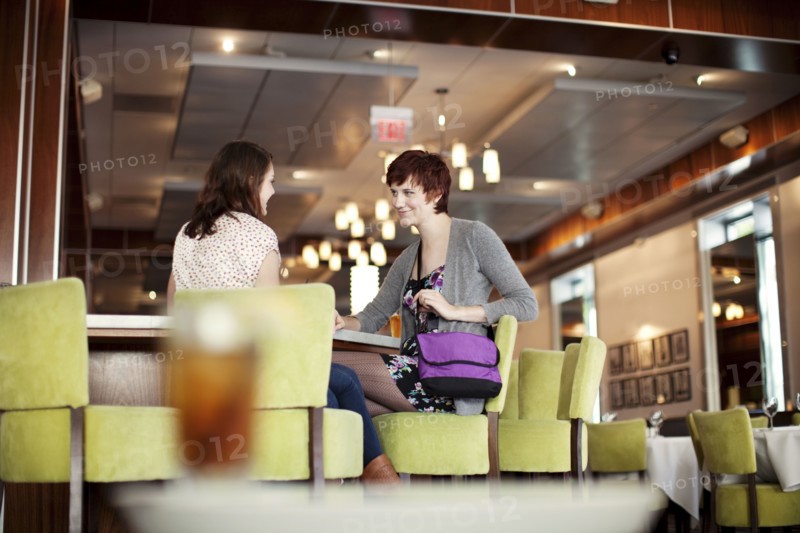 Caucasian women having lunch in diner