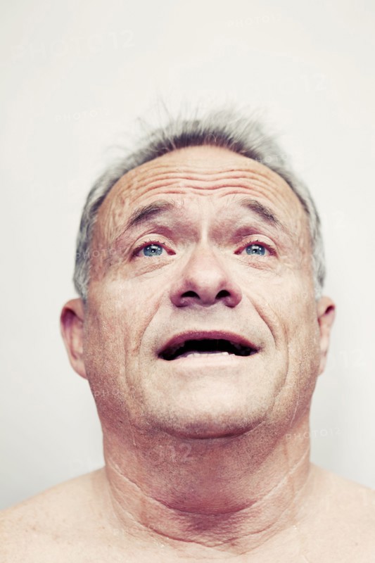 Older Caucasian man crying