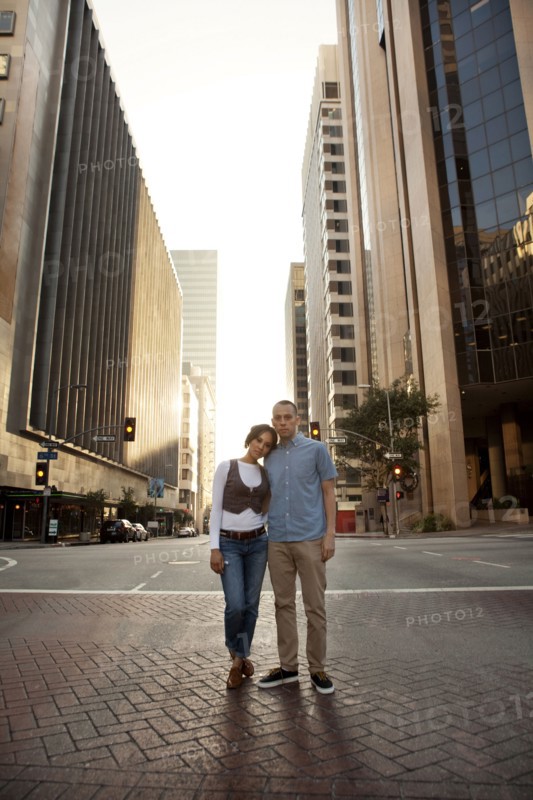 Couple standing on city street