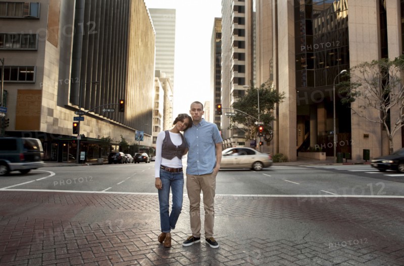 Couple standing on city street