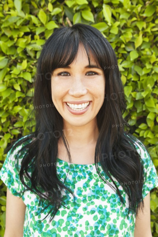 Woman smiling outdoors