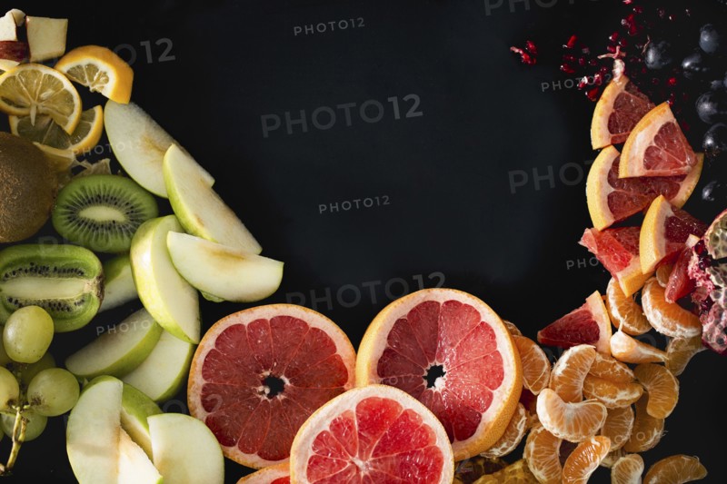 Close up of variety of sliced fruit
