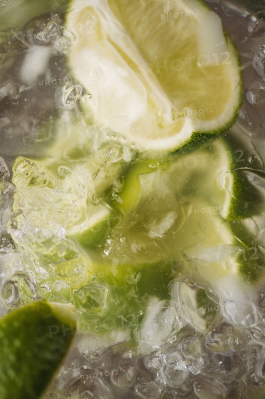 Close up of lime in iced drink