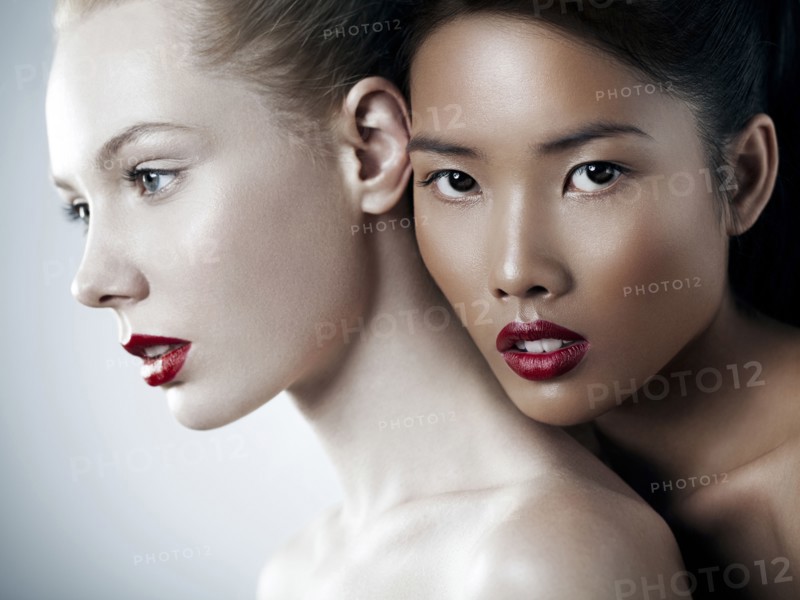 Close up of women wearing red lipstick