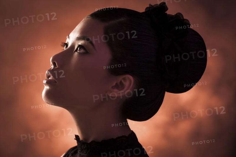 Close up of glamorous woman looking up