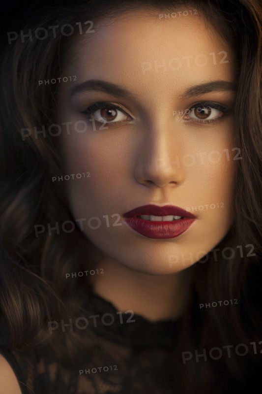Close up of serious glamorous woman