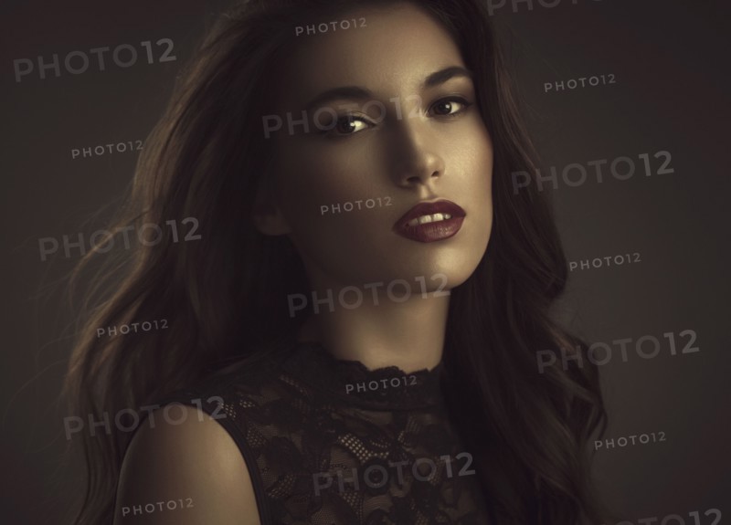 Close up of serious glamorous woman
