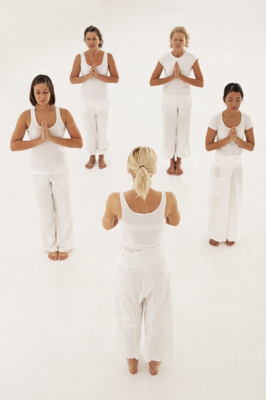 Women meditating in yoga class