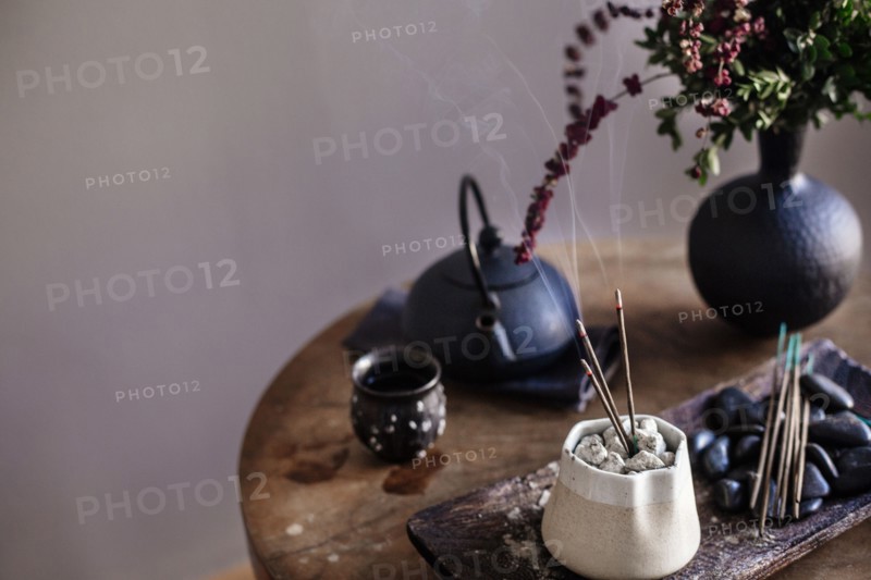 Incense burning on table