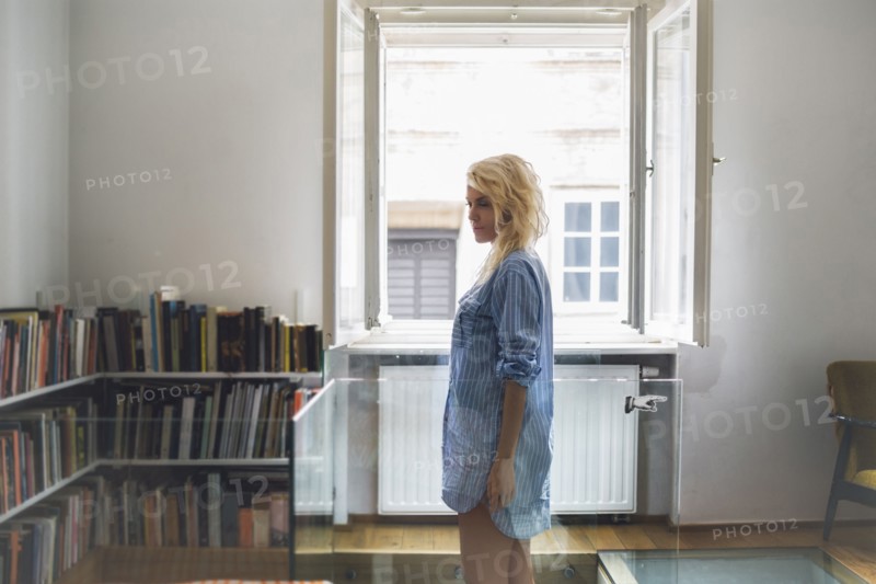 Woman standing in living room