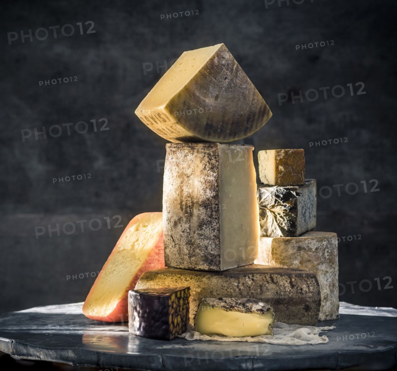 Pile of variety of cheeses