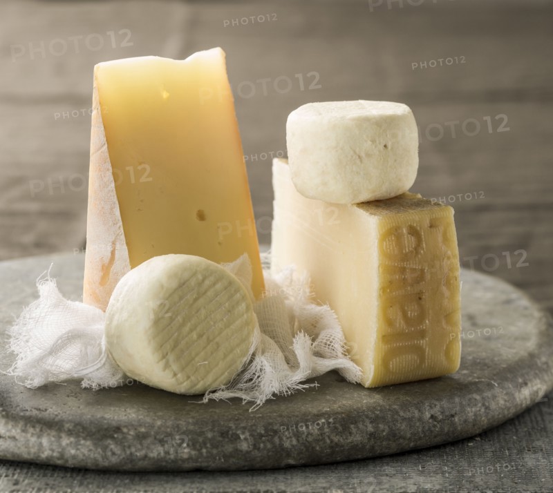 Wedges of cheese and cheesecloth