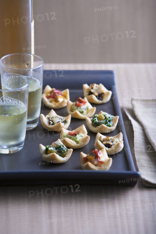 Hors d'oeuvres and glasses on tray