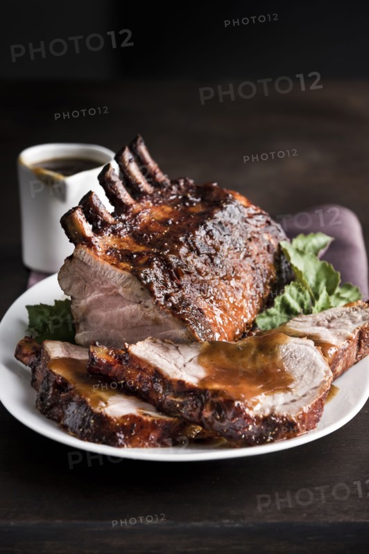 Sliced rack of pork on plate