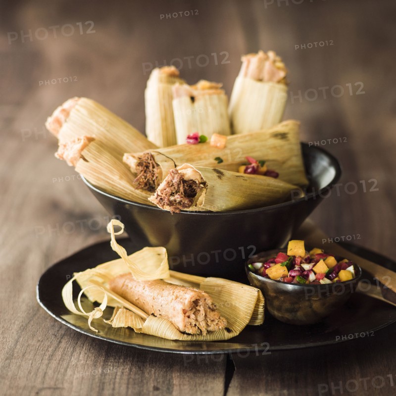 Bowl of tamales with salsa