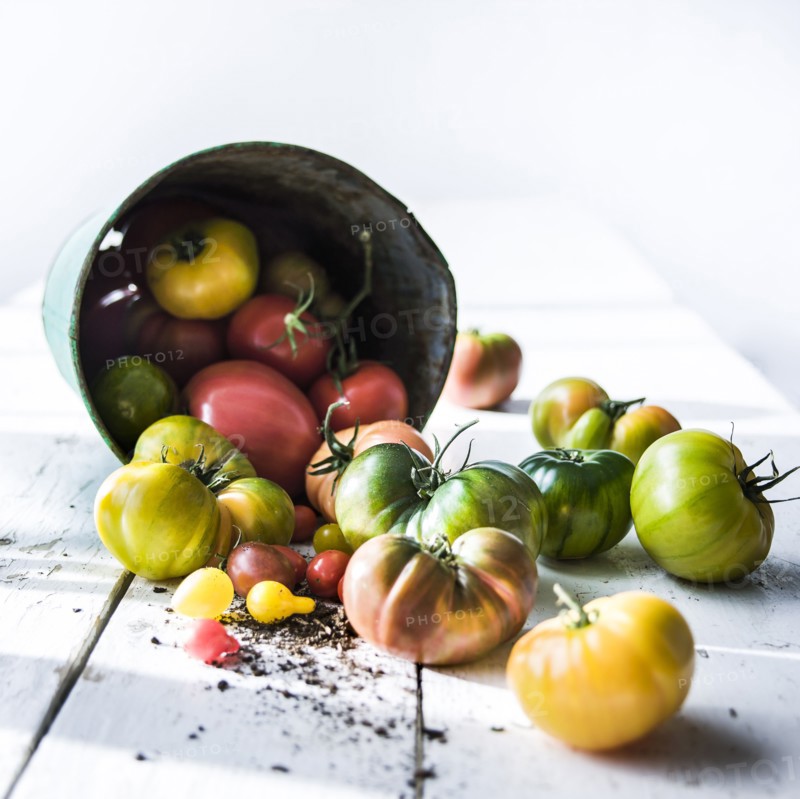 Fresh tomatoes on wooden table