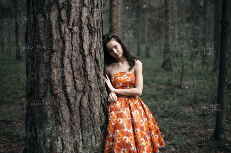 Caucasian woman standing in forest