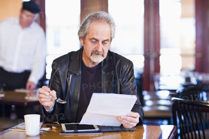 Caucasian man using tablet computer